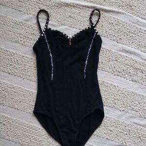 Wear Moi Black with crystals One Piece. Size S